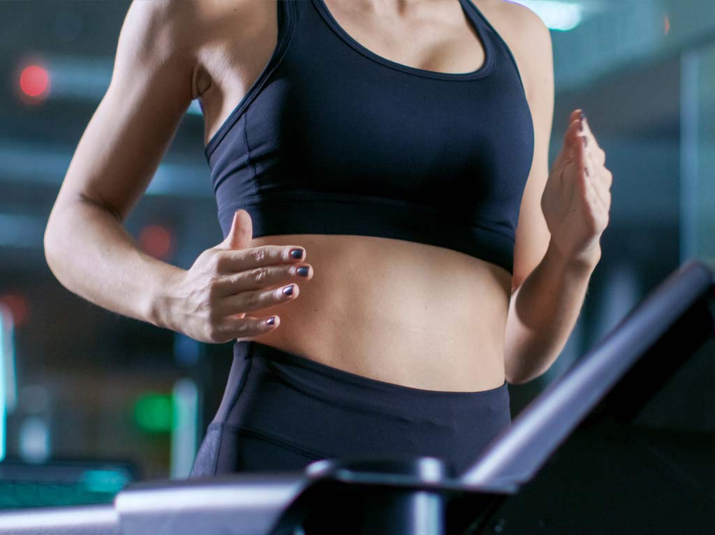 Female on running machine